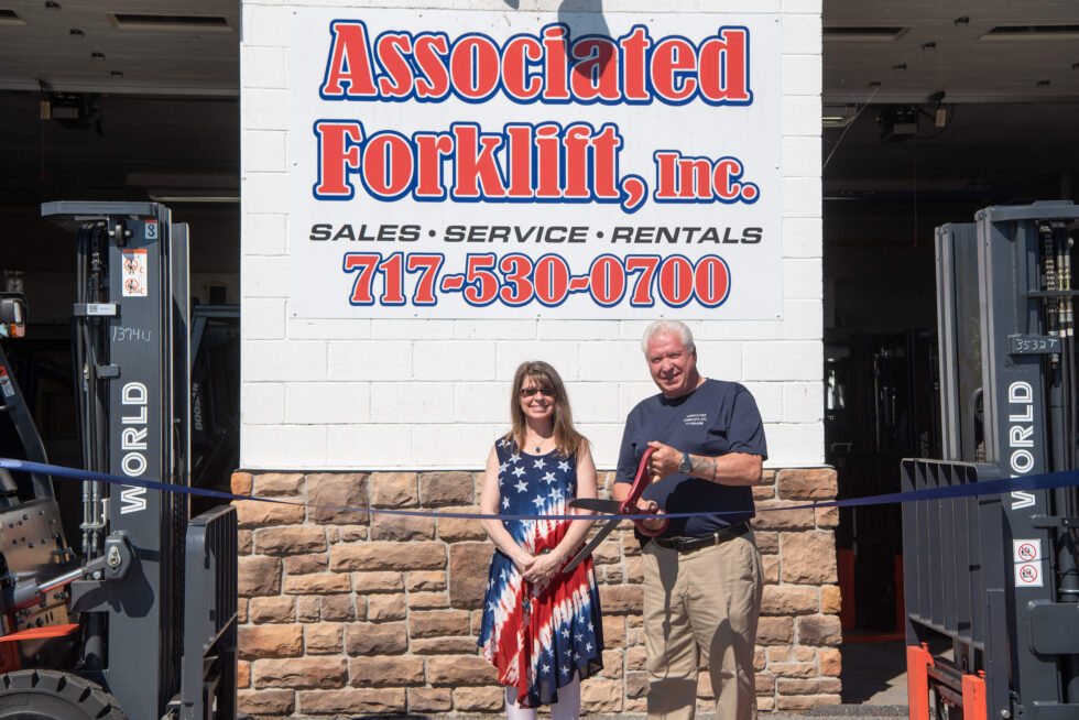 The owners cut the ribbon on New Location in Carlisle